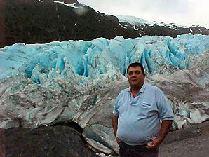 George DeLange With Exit Glacier Blue Ice. Alaska Travels & Tours Pictures, Photos, Images, & Reviews.