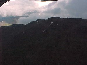 Cloud Break. Flightseeing Tour Of Mount McKinley, Alaska. Travels & Tours Pictures, Photos, Images, & Reviews.