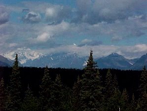 Denali Clouds. Denali or Mount McKinley Alaska. Travels & Tours Pictures, Photos, Images, & Reviews.