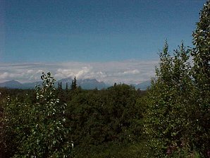 Denali Clouds. Denali or Mount McKinley Alaska. Travels & Tours Pictures, Photos, Images, & Reviews.