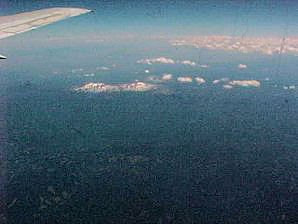 West Coast USA Volcanoes Viewed From High Altitude Aircraft. Travels & Tours Pictures, Photos, Images, & Reviews.