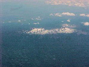 West Coast USA Volcanoes Viewed From High Altitude Aircraft. Travels & Tours Pictures, Photos, Images, & Reviews.