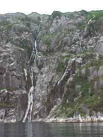 Holgate Glacier Waterfalls. Alaska Kenai Fjord Cruise. Travels & Tours Pictures, Photos, Images, & Reviews.
