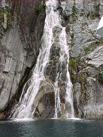 Holgate Glacier Waterfalls. Alaska Kenai Fjord Cruise. Travels & Tours Pictures, Photos, Images, & Reviews.