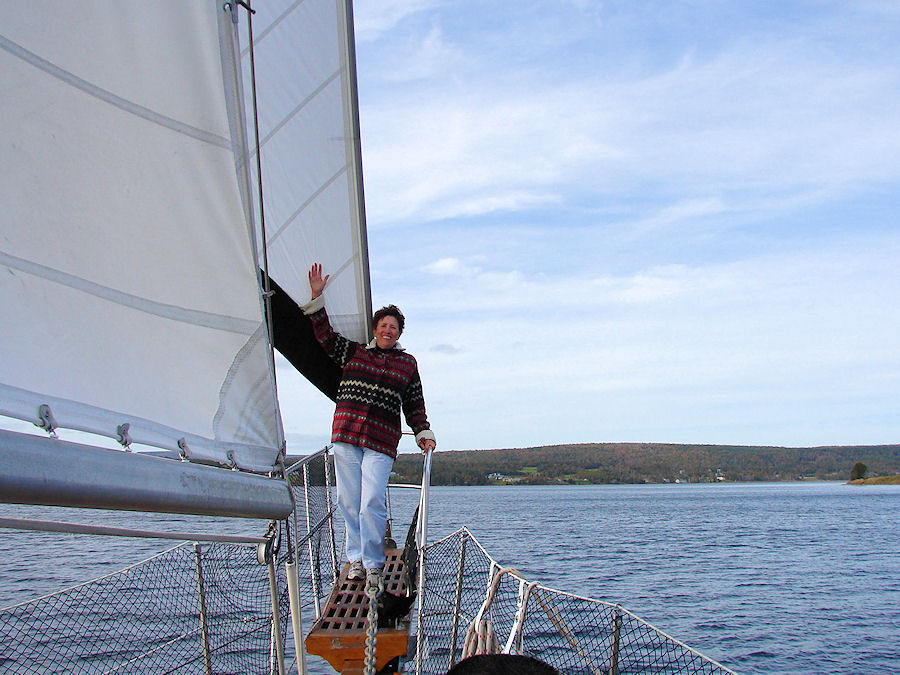 Eve DeLange On The 'Amoeba' As We Sail The Bras D'or Lakes at Baddeck, Nova Scotia with Amoeba Sailing Tours. Travels, Tours, Photos, Pictures, Images, Information, & Reviews.