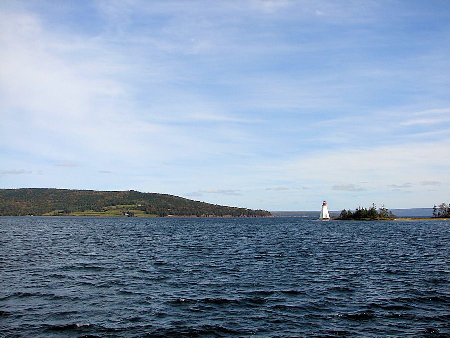 Beinn Bhreagh & Kidston Island Light House; From The 'Amoeba' Port As We Sail The Bras D'or Lakes at Baddeck, Nova Scotia with Amoeba Sailing Tours. Travels, Tours, Photos, Pictures, Images, Information, & Reviews.