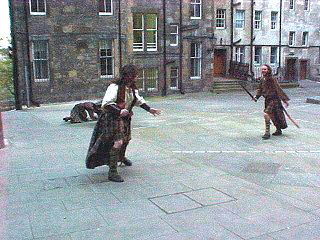 The Highlanders Settle A Dispute. Edinburgh & Edinburgh Castle. Edinburgh, Scotland In The UK. History & Historical. Travels & Tours, Pictures & Photos, Images, Information & Reviews.