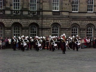 Near The Parliament Building Edinburgh, Scotland. The Band of HM Royal Marines Scotland. In The UK. Travels & Tours Pictures, Photos, Images, Information, Reviews.