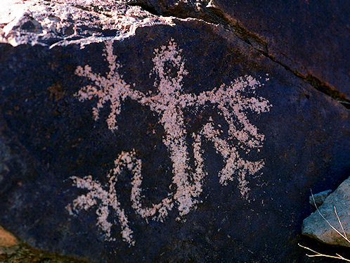 Petroglyph At Sloan Canyon Petroglyph Site Near Las Vegas & Henderson, Nevada, In The Northwestern McCullough Mountain Range. Travel & Tour Pictures, Photos, Images, Information & Reviews.