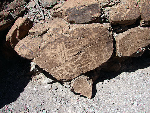Petroglyph Below Third Waterfall. At Sloan Canyon Petroglyph Site Near Las Vegas & Henderson, Nevada, In The Northwestern McCullough Mountain Range. Travel & Tour Pictures, Photos, Images, Information & Reviews.