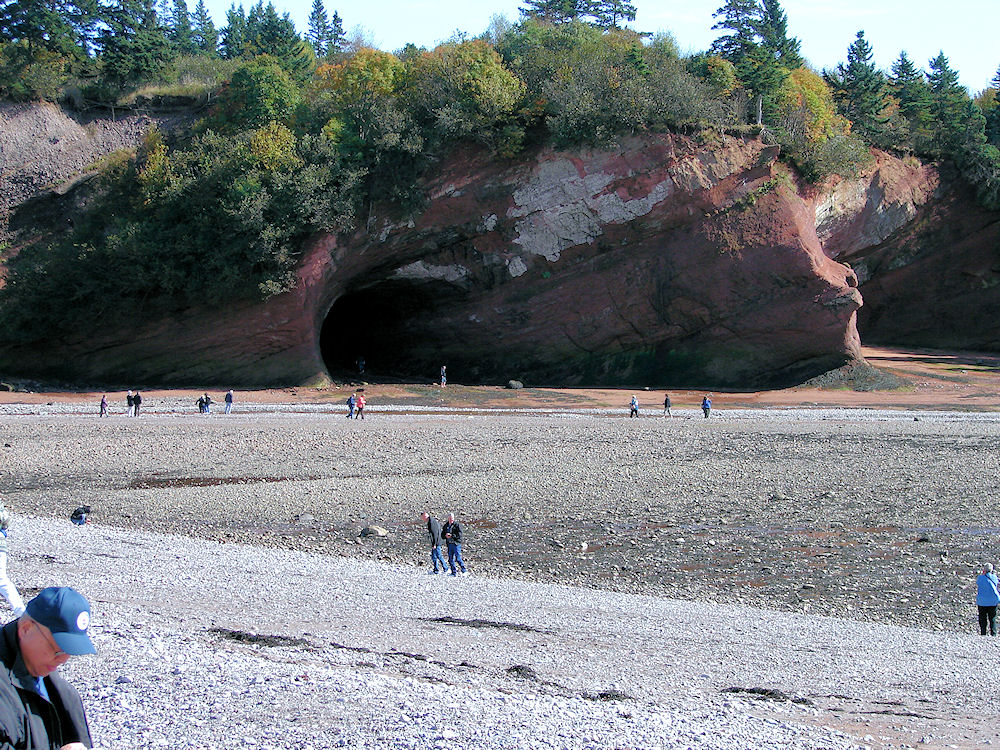 Saint Martins Beach Caves. People Searching For A Coveted 'Wish Rock.' New Brunswick, Canada. Travel, Tours Photos, Pictures, Information, & Reviews.