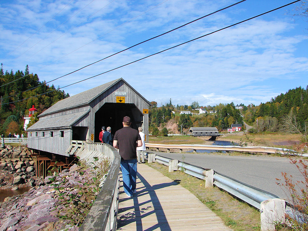 View Of Lighthouse & Both Of Saint Martins Covered Bridges Together. Considered To Be The Only Place In The World Where This Is possible. New Brunswick, Canada. Travel, Tours Photos, Pictures, Information, & Reviews.